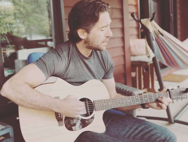 Acoustic guitar on the porch